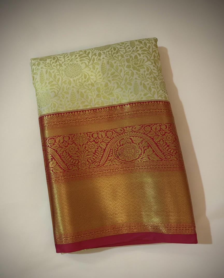 Cream Kanchipuram Semi Silk Saree with Golden Zari Border and Pink Accent