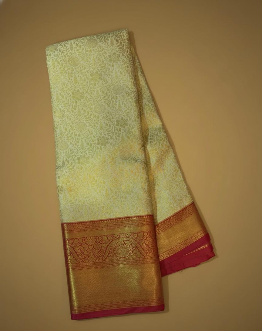 Cream Kanchipuram Semi Silk Saree with Golden Zari Border and Pink Accent